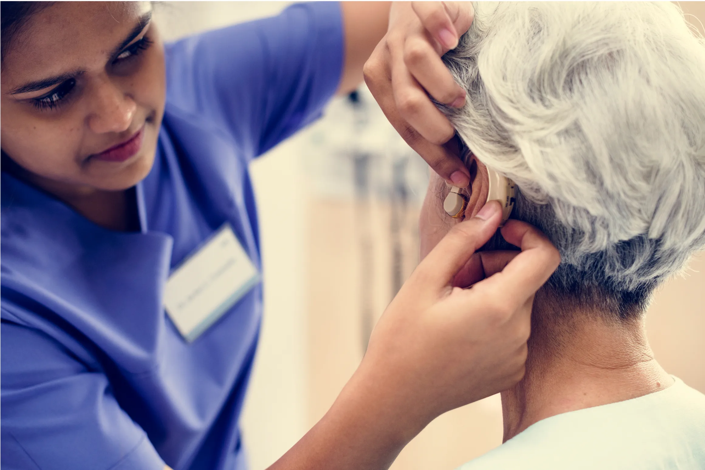 an-elderly-woman-with-hearing-aid-2022-12-16-00-23-02-utc