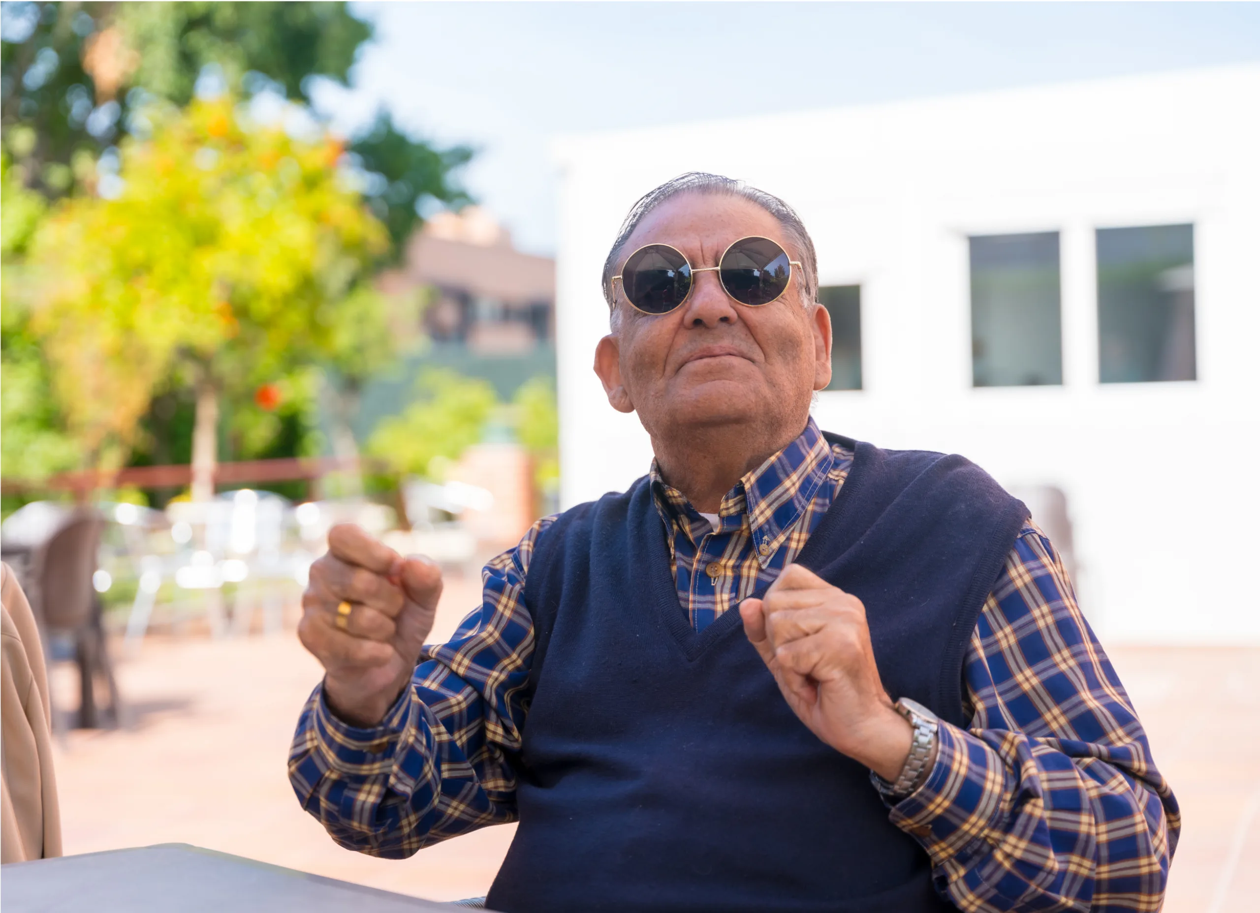 an-elderly-man-dancing-in-the-garden-of-a-nursing-2023-07-05-17-26-50-utc