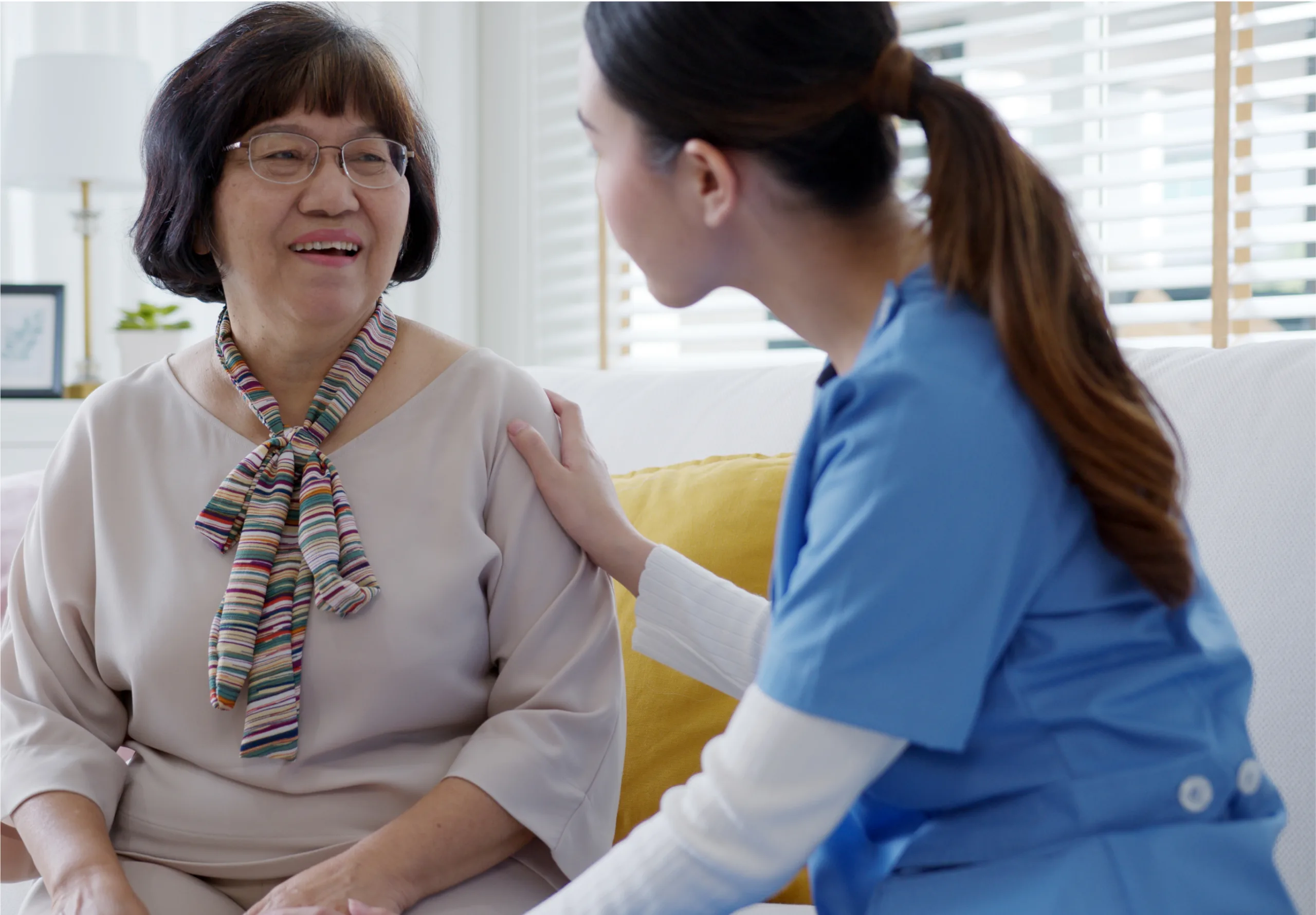 nurse-home-care-hand-on-senior-grandmother-shoulde-2021-10-21-03-46-37-utc